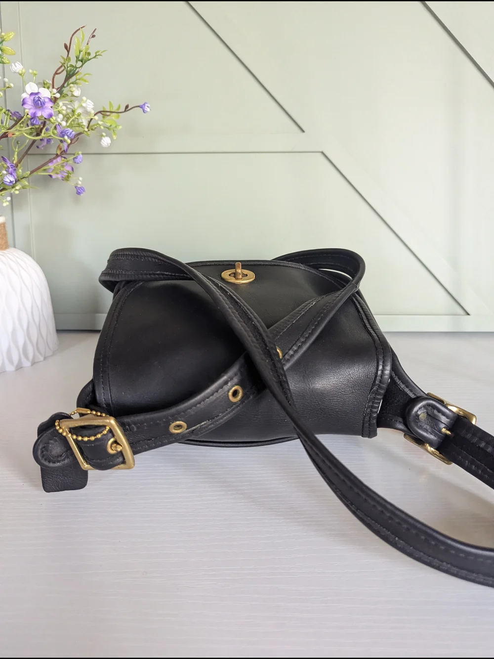 Coach Black Leather Crossbody with Gold Hardware and Cherry Charm